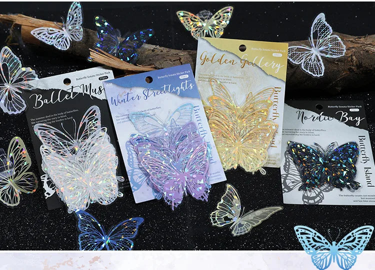 A collection of iridescent butterfly stickers in various shades and finishes for journaling and crafts.