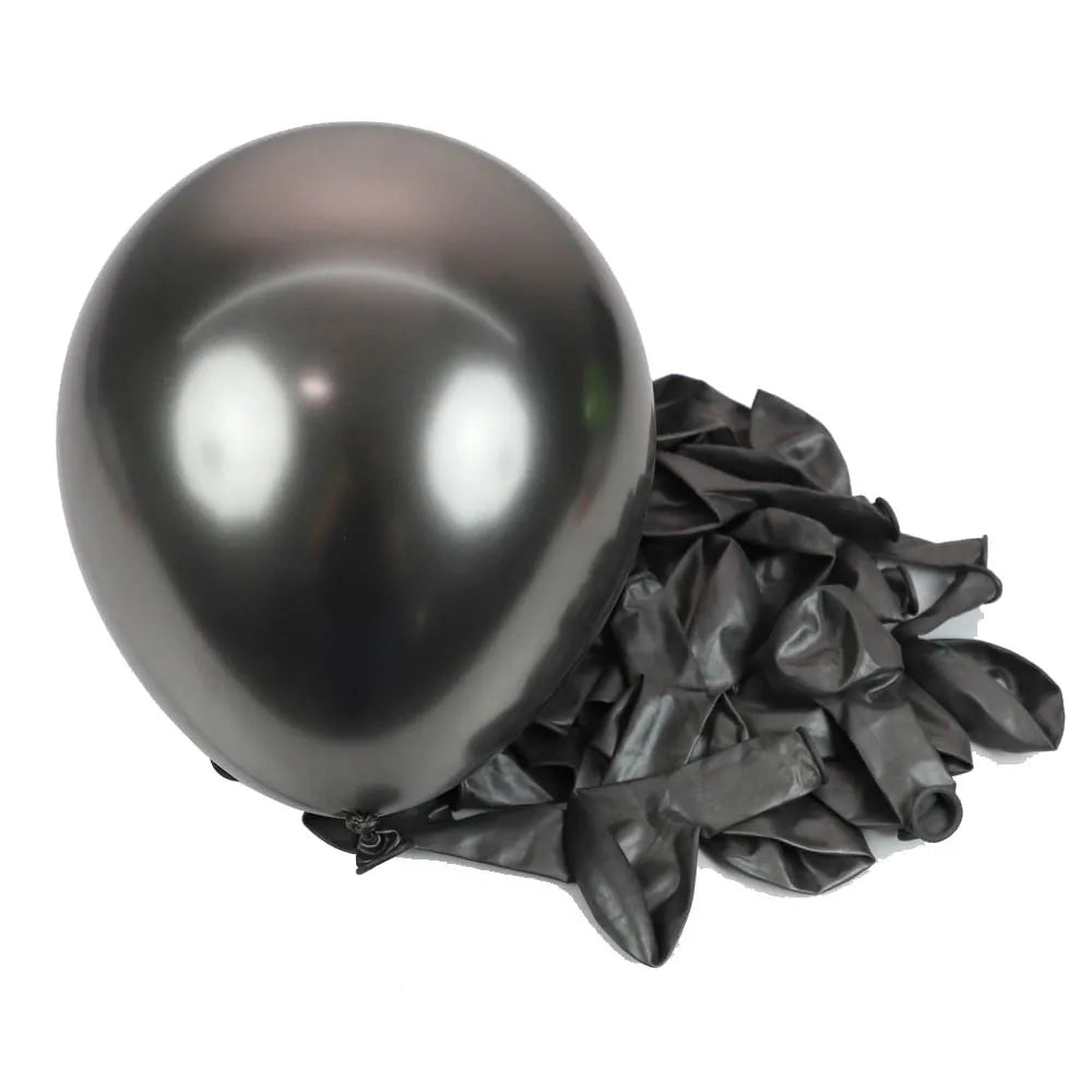 A single dark metallic balloon is shown next to a cluster of crinkled black latex balloons for party decor.