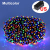 A spherical cluster of multicolor LED string lights illuminating a dark background.
