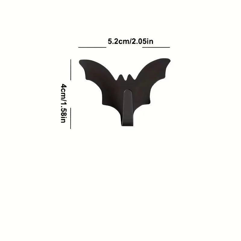 A set of five black gothic bat adhesive hooks for keys and bags.