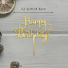 Gold acrylic cake topper saying Happy Birthday on a stick