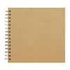 A blank tan spiral-bound notebook or scrapbook album with metal rings on the left edge.