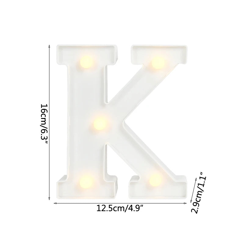 A white alphabet letter K light with warm white LED illumination.