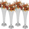 Vier silberne Kristallvase mit herbstlichen Blumenarrangements als Centerpieces