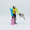 A set of colorful robot figures, including a yellow and black figure, a blue figure, and a pink figure, arranged together.