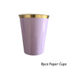 A single purple paper cup with a gold rim is shown against a white background.