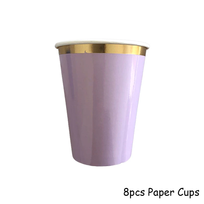 A single purple paper cup with a gold rim is shown against a white background.