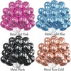 Un ensemble de ballons métalliques dans les couleurs rose, bleu clair, noir et or rose.