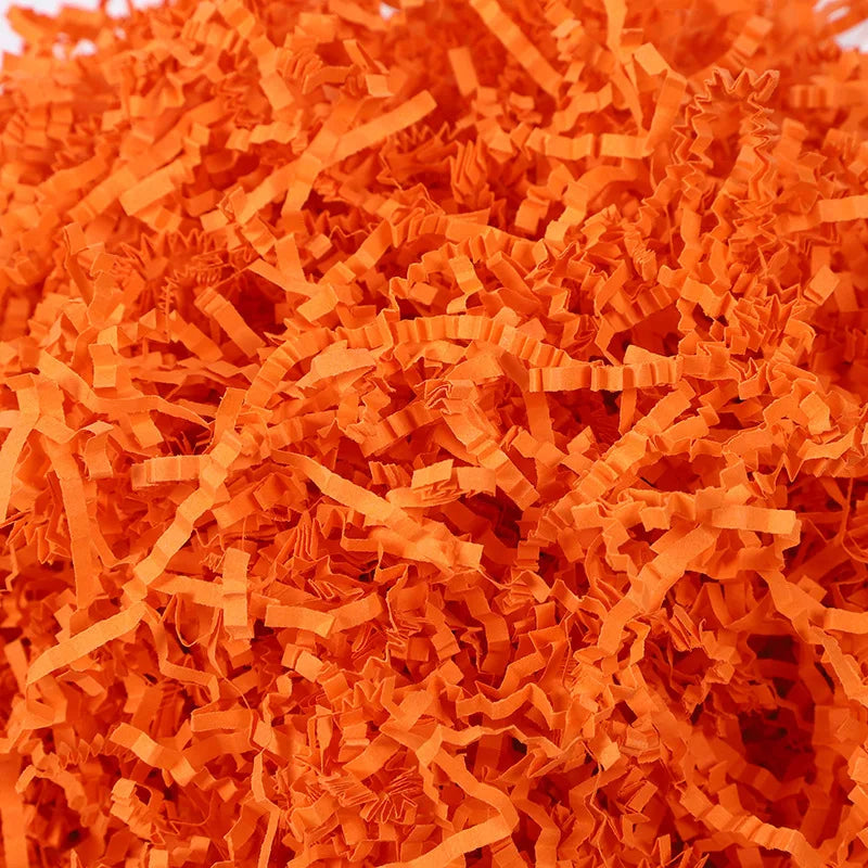 Orange crinkle paper shred filler for Halloween treat bags and décor