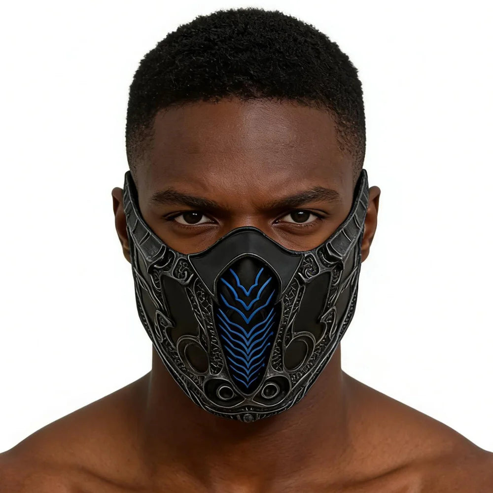 A close-up of a black half-face mask resembling Sub-Zero and Scorpion from Mortal Kombat, featuring blue accents.