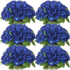 A bouquet of deep blue artificial silk roses arranged for table decor.