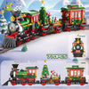 A set of building blocks featuring Santa, a Christmas tree, and train models.