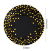 A black disposable dinner plate rimmed with gold polka dots, shown from above.