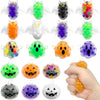 A collection of various squishy beads shaped like cats, pumpkins, and other Halloween characters.