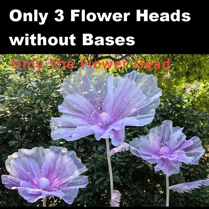 Three large purple velvet mesh flower heads without bases displayed against green foliage.