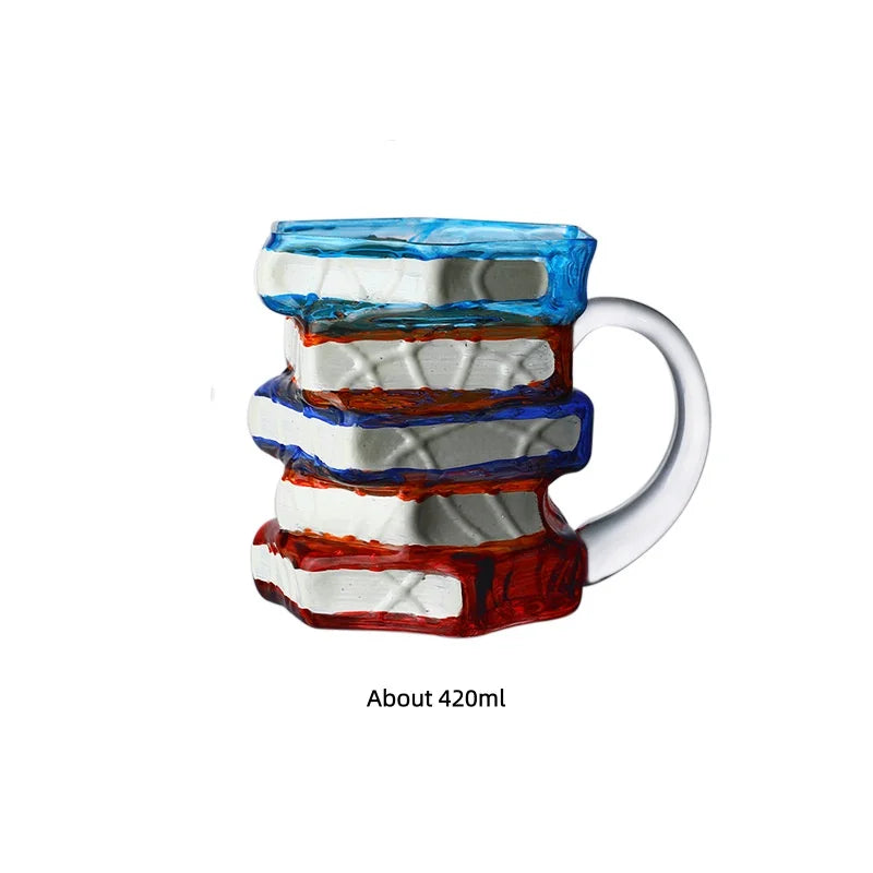 A stack of hand-painted ceramic mugs featuring layered blue, white, and reddish designs.