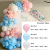 A balloon garland featuring pink and blue balloons arranged in an archway for decoration.