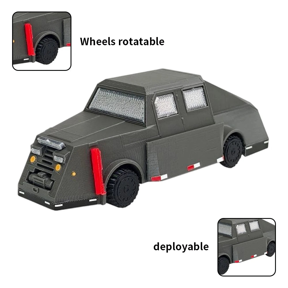 A gray die-cast model of a vehicle with detachable wheels and a deployable feature.