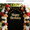 A festive birthday backdrop decorated with gold, black, and white balloons and string lights.