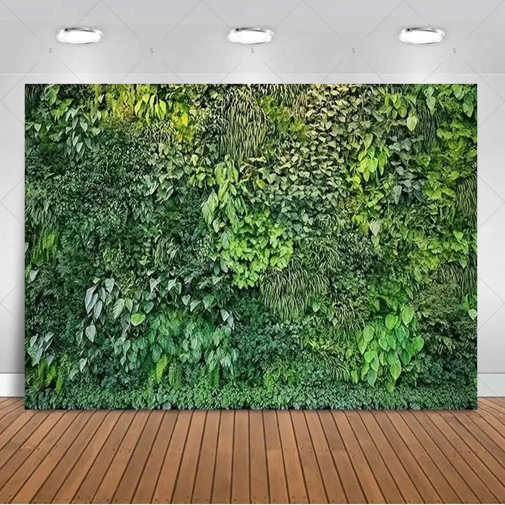 A lush green tropical palm leaf backdrop covering a wall for party decor and photography.
