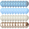 A collection of latex confetti balloons in muted blue and white tones arranged in rows.