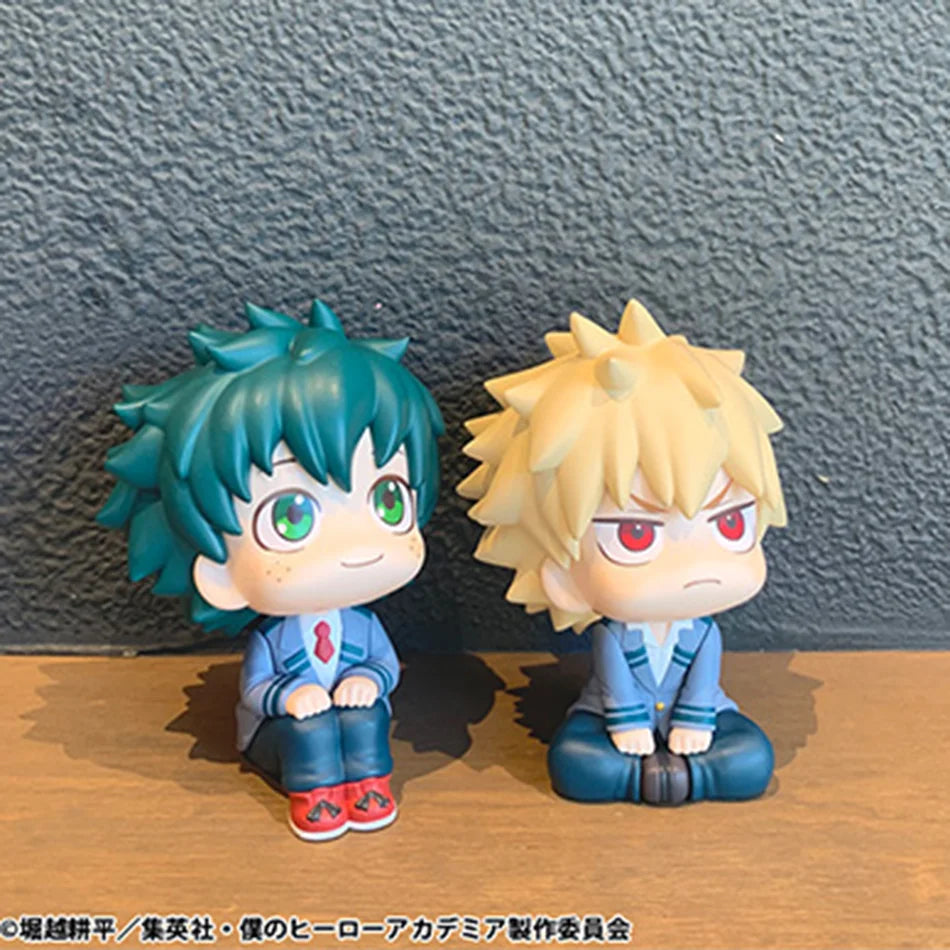 Two chibi collectible figures of anime characters from My Hero Academia, featuring bright teal and blonde hair.