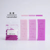 Lavender flower petal dye colorants in various shades of purple and pink displayed next to a lavender candle product.
