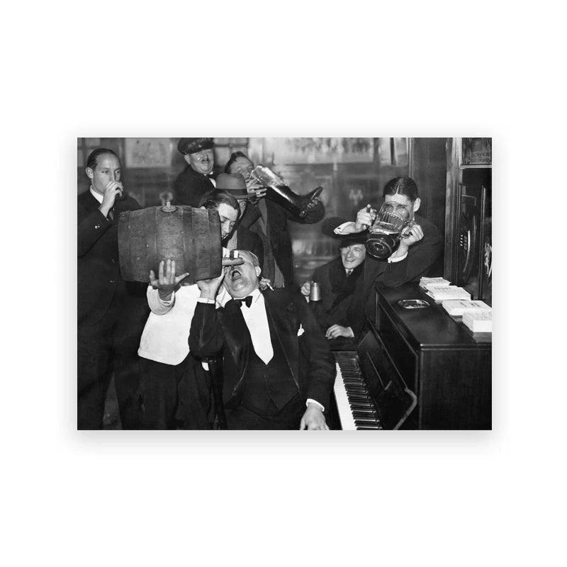 Black and white photograph of men in suits and hats gathered around a piano.