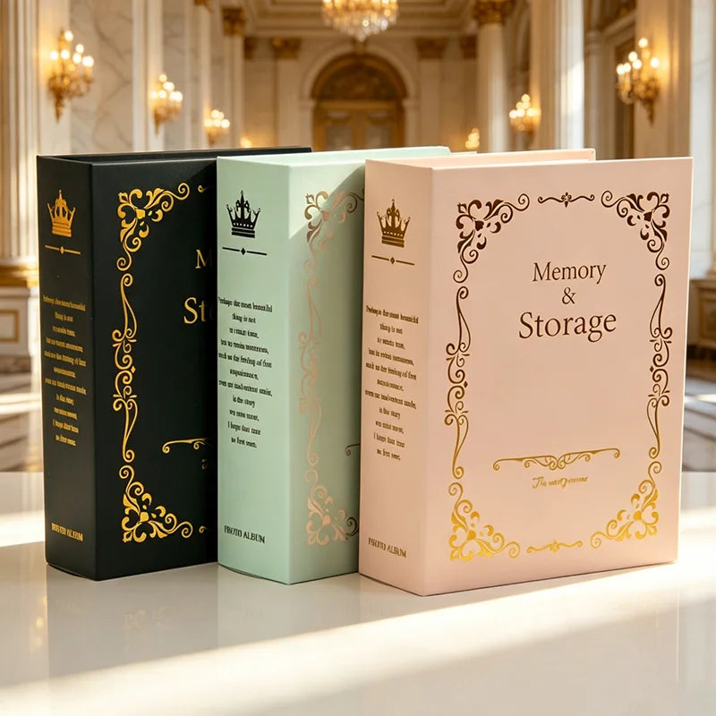 Three vintage gold foil photo albums in black, mint green, and blush pink displayed on a white surface.