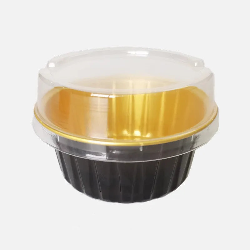 Reusable aluminum foil dessert ramekins with lids in gold and black.