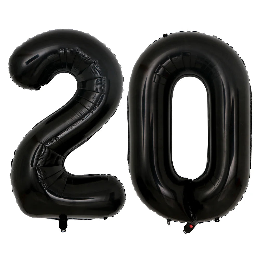 A set of two black foil balloons shaped like the number 20