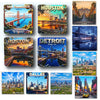 A collection of magnets featuring landmarks and cityscapes from various American cities including San Francisco, Houston, Bos