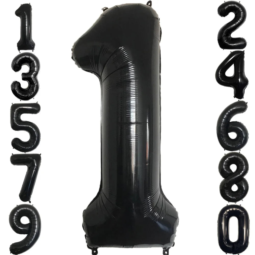A black jumbo foil number balloon shaped like the numeral 13579.