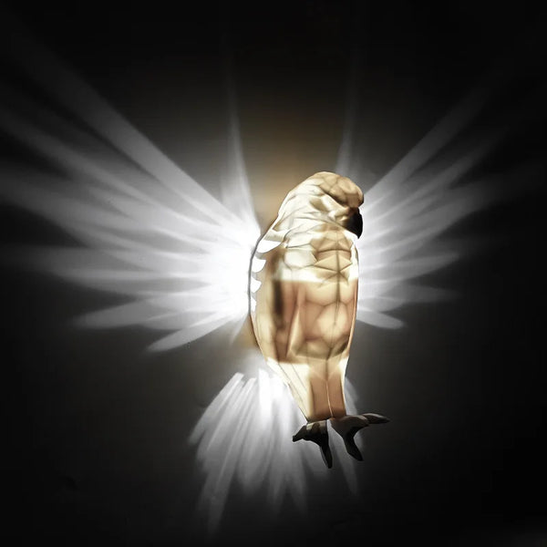 A golden eagle with glowing wings is illuminated by bright light rays against a dark background.