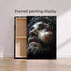 Framed painting display showing a dramatic portrait of Jesus Christ with dripping blood.