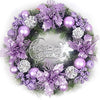 A wreath of purple and white silk artificial Christmas flowers with gold sparkle finish