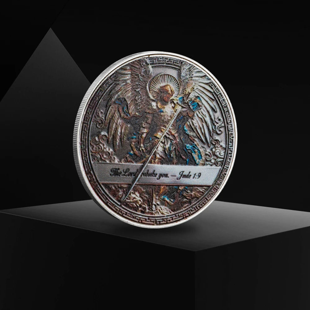 A commemorative coin featuring the Archangel Michael as a guardian angel, struck in silver.
