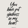 Black script text of Psalm 4:7 on a light gray background