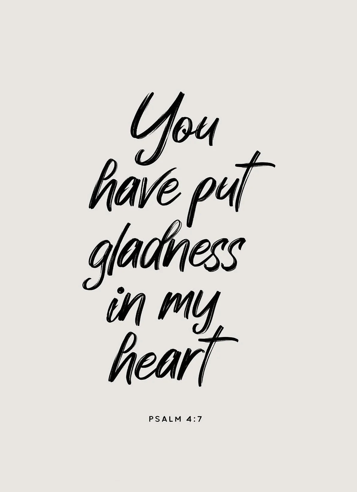Black script text of Psalm 4:7 on a light gray background