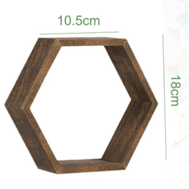 A wooden hexagon floating shelf with dimensions 10.5cm by 18cm.
