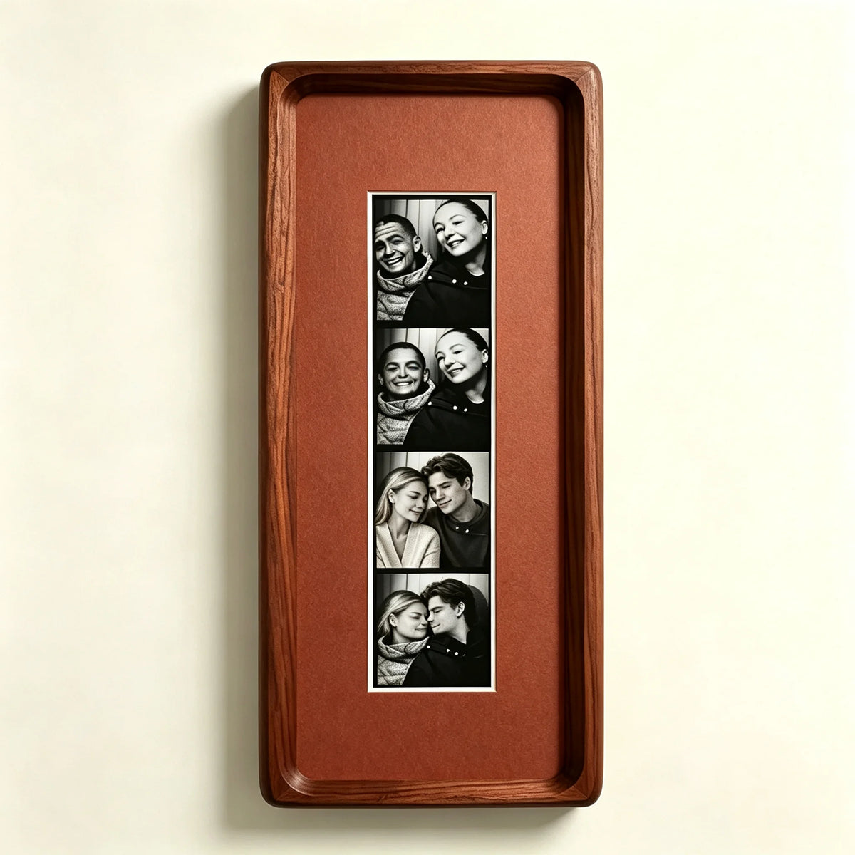 A rectangular walnut wood photo strip frame displaying a series of portrait photographs.