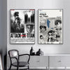 Wall art featuring two posters inspired by Attack on Titan manga and anime characters