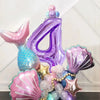 A set of iridescent and metallic purple balloons shaped like the number four and mermaid shells for a party decoration