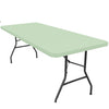 A light green stretch elastic tablecloth cover draped over a rectangular table.