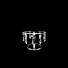 Elegant transparent acrylic cake display rack with hanging decorative elements.