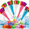 A collection of colorful water balloon fillers and balloons are shown splashing in water.