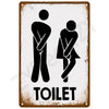 A vintage brown tin sign with a white silhouette of two figures and the word TOILET.