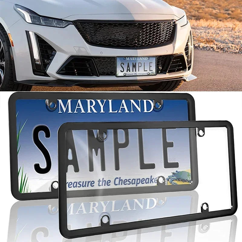 A black license plate frame with a Maryland sample plate displayed on a silver car.