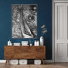 A framed black and white canvas art print featuring a leopard print silhouette against a dark background.