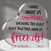 A clear heart-shaped plaque engraved with the text Chance made us coworkers surviving this crazy place together made us frien